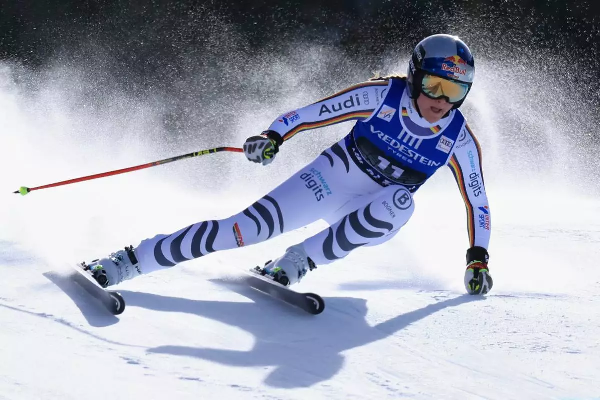 Germany's Emma Aicher speeds down the course during an alpine ski, women's World Cup downhill, in Val di Fassa, Italy, Friday, March 6, 2026. (AP Photo/Luciano Bisi) CORRECTION: Date corrected to March 6, instead of February 27.