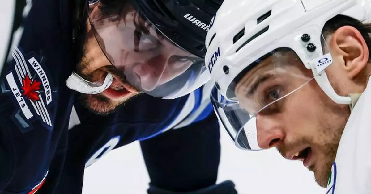 Morrissey scores OT winner in return to set Jets' points mark for defensemen in 3-2 win over Canucks