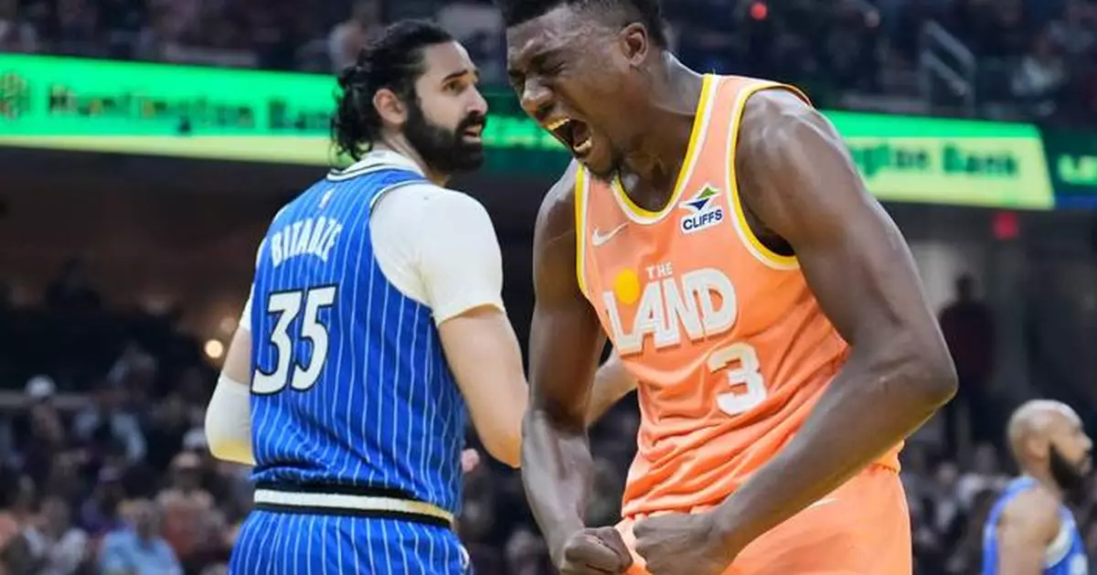 Mitchell scores 42 as Cavaliers defeat Magic 136-131 to extend winning streak to 4 games