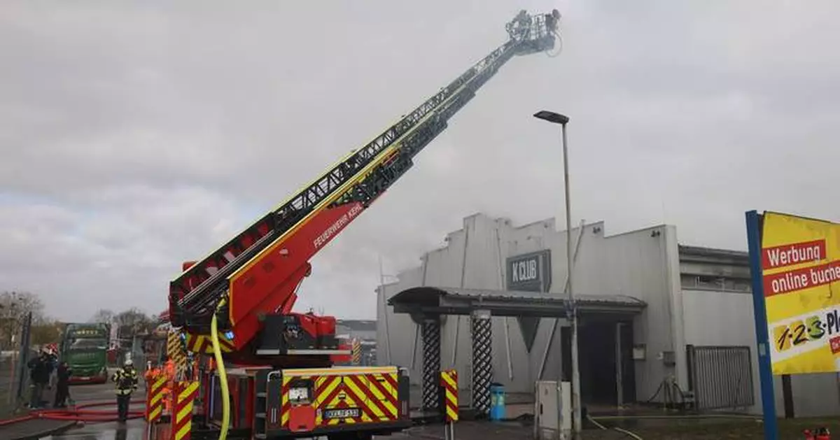 Hundreds of revellers flee after fire breaks out at a dance club in Germany