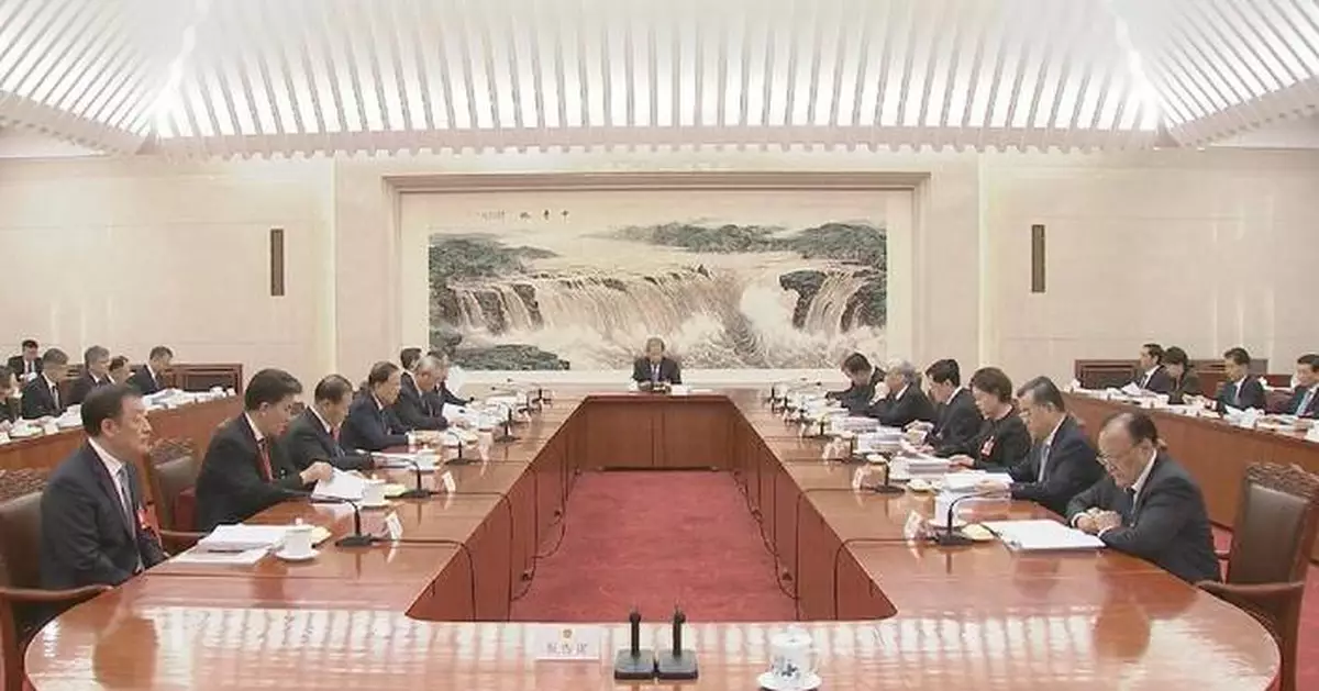 China's national legislature holds 2nd presidium meeting at annual session