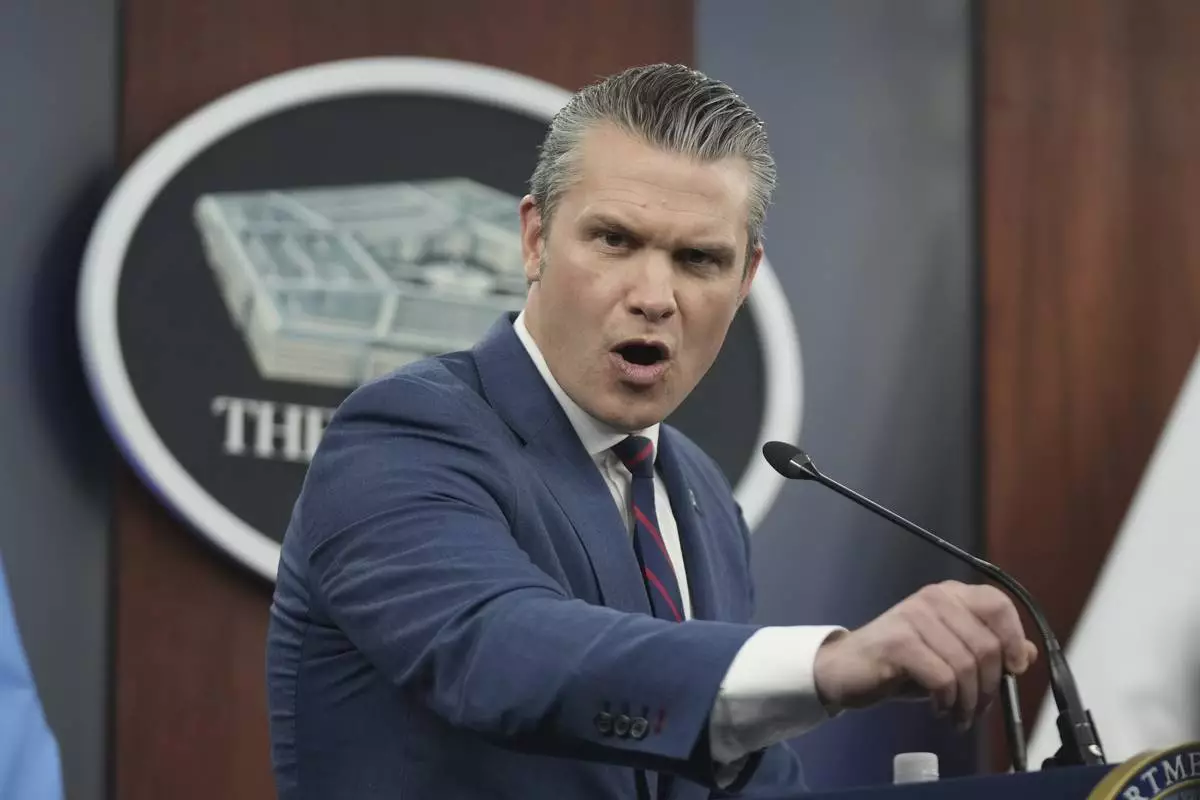 Defense Secretary Pete Hegseth speaks during a press briefing at the Pentagon, Monday, March 2, 2026, in Washington. (AP Photo/Mark Schiefelbein)