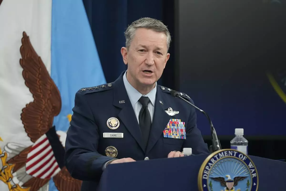 Chairman of the Joint Chiefs of Staff Gen. Dan Caine speak during a press briefing at the Pentagon, Monday, March 2, 2026, in Washington. (AP Photo/Mark Schiefelbein)