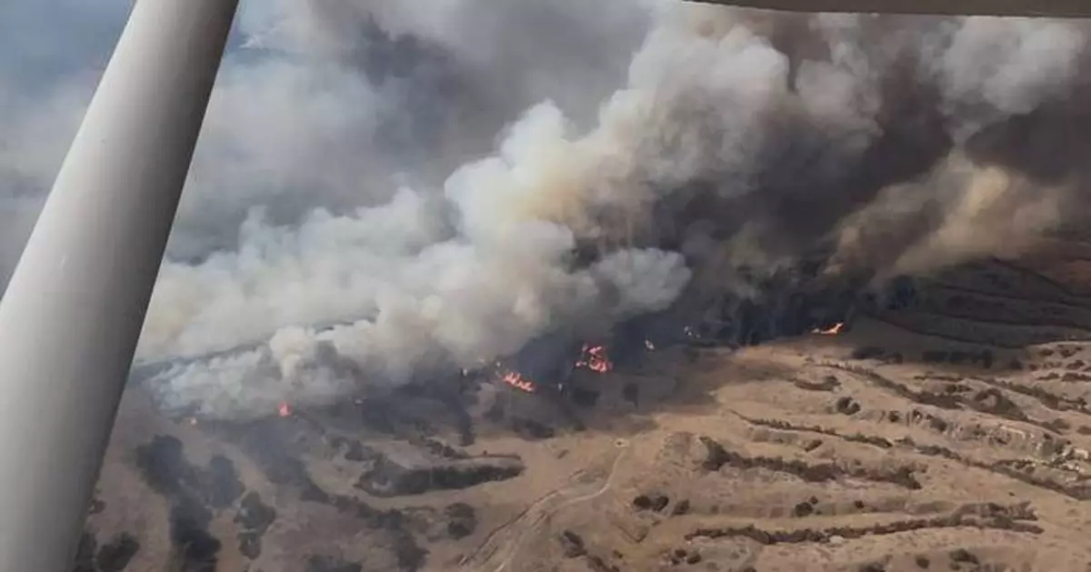Nebraska wildfire fight drags into day 7 as winds ease, but danger still looms