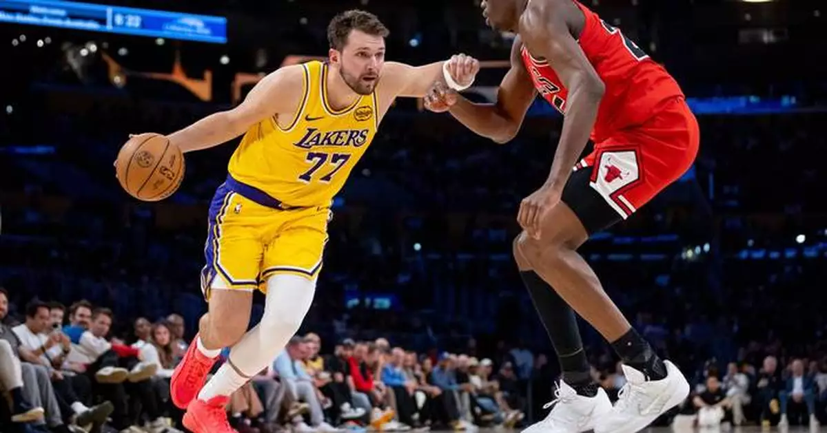 Luka Doncic scores 51, LeBron James returns from injuries to lead Lakers past Bulls 142-130