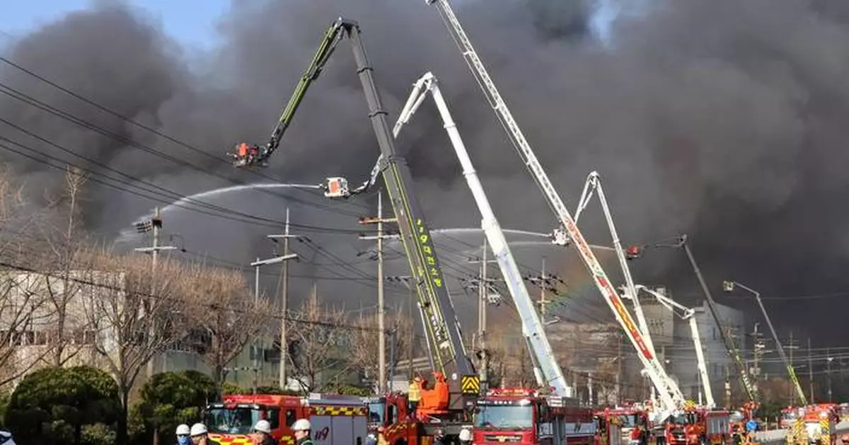 Officials say 14 were killed in fire at South Korean auto parts plant