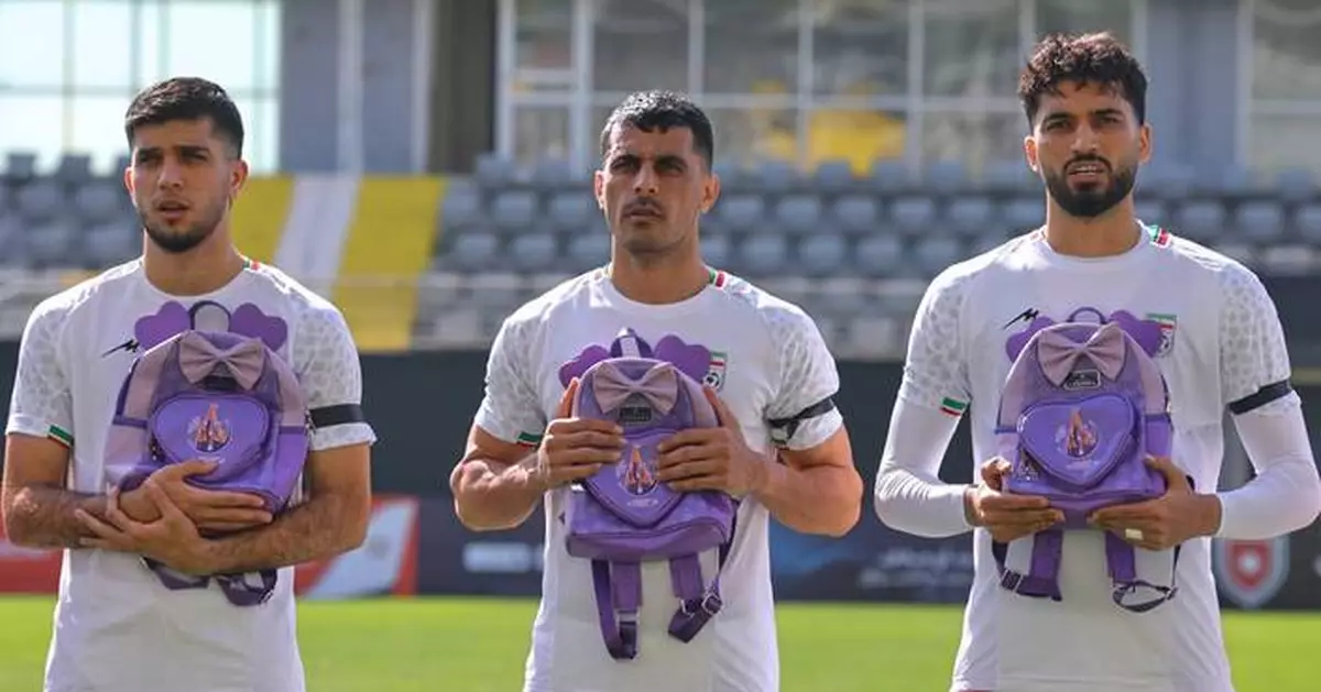 Iran's soccer team honors victims of deadly missile strike on elementary school