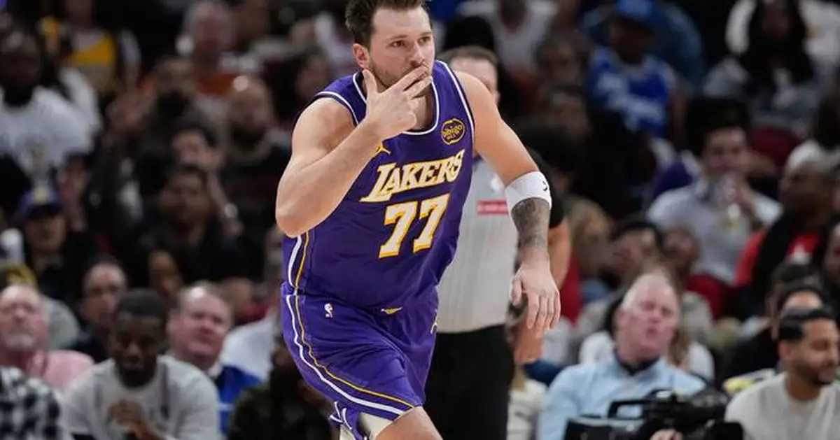 Doncic drops 40, James adds 30 as Lakers stretch their streak to 7 with 124-116 win over Rockets