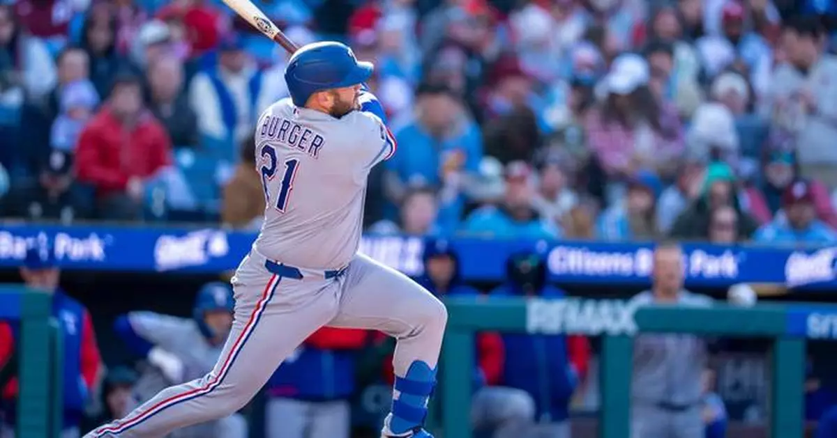 Rangers blow 3-run lead in 9th inning but recover to top Phillies 5-4 in the 10th
