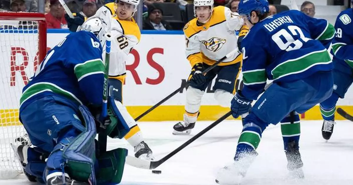 DeBrusk scores only goal of shootout to lift Canucks over Predators 4-3