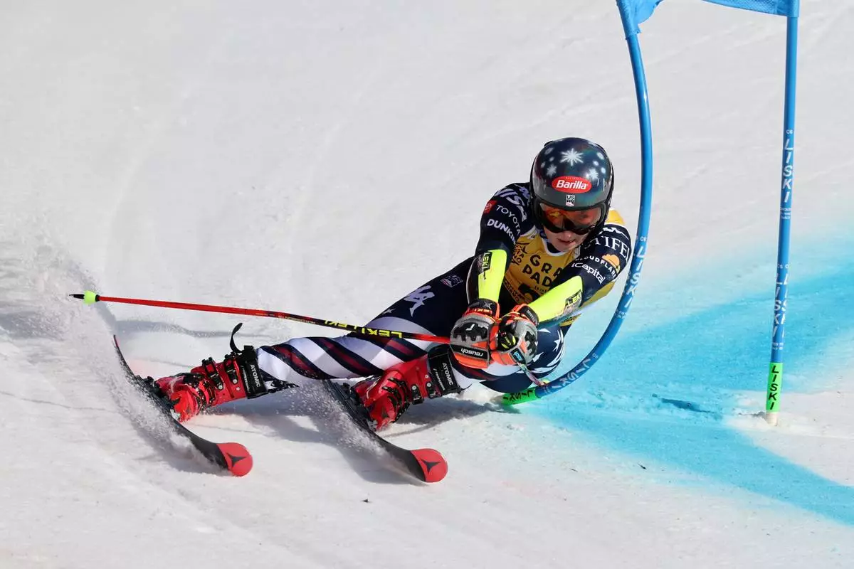 United States' Mikaela Shiffrin speeds down the course during a women's World Cup giant slalom, in Are, Sweden, Saturday, March 14, 2026. (AP Photo/Marco Trovati)