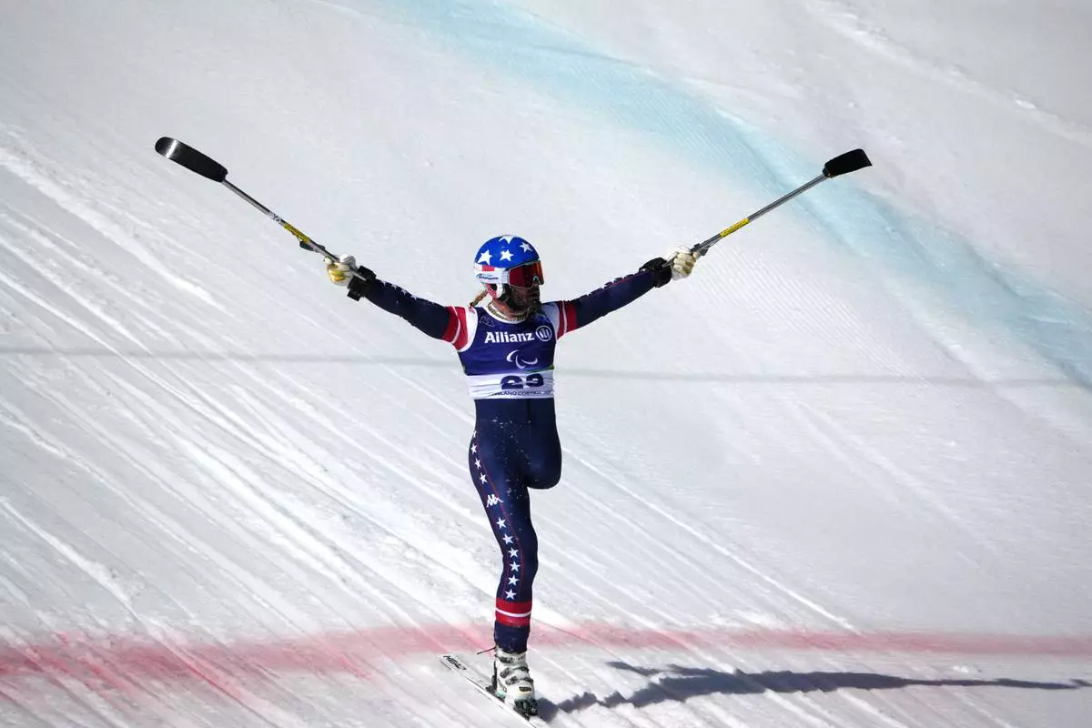 Patrick Halgren, of the United States, reacts after competing in the alpine skiing men's downhill standing competition at the 2026 Winter Paralympics, in Cortina d'Ampezzo, Italy, Saturday, March 7, 2026. (AP Photo/Emilio Morenatti)