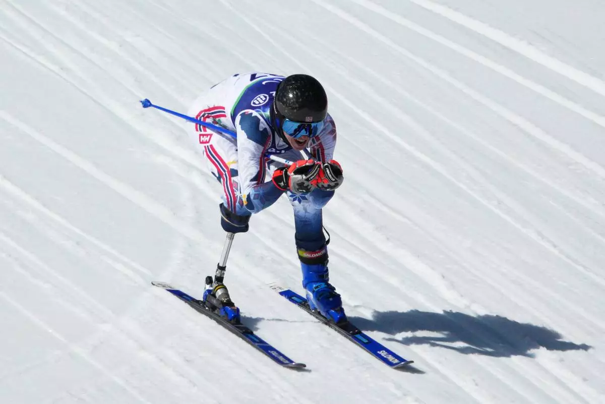 Bernt Marius Roerstad, of Norway, competes in the alpine skiing men's downhill standing competition at the 2026 Winter Paralympics, in Cortina d'Ampezzo, Italy, Saturday, March 7, 2026. (AP Photo/Emilio Morenatti)
