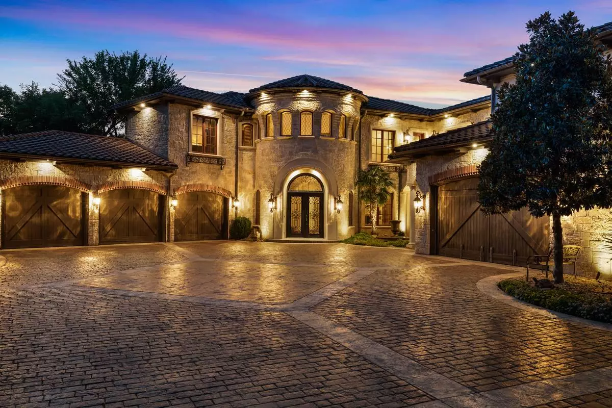 Tuscan-inspired estate spans 10 acres and includes a car collector’s dream auto showroom, outdoor-indoor pool, panoramic views, landscaped grounds and an equestrian barn, all within 40 miles of downtown Dallas, Texas (Photo Credit: Camila Will Photography).