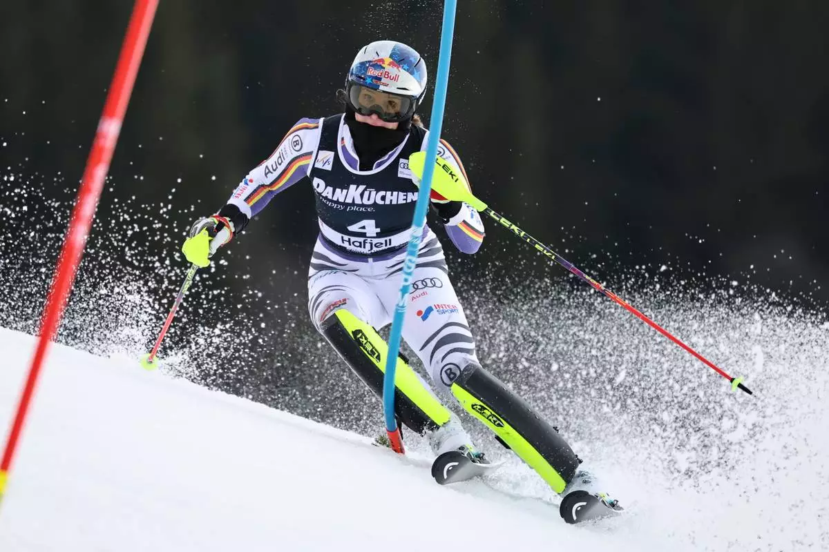 Germany's Emma Aicher competes in an alpine ski, women's slalom race, at the Lillehammer World Cup Finals, in Hafjell, Norway, Tuesday, March 24, 2026. (AP Photo/Marco Trovati)