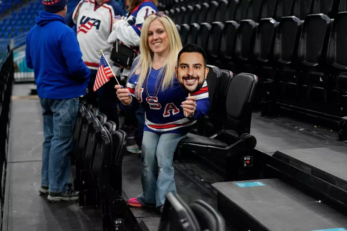 United States women's para ice hockey captain Erica McKee poses at the 2026 Winter Paralympics, in Milan, Italy, Monday, March 9, 2026. (AP Photo/Luca Bruno)