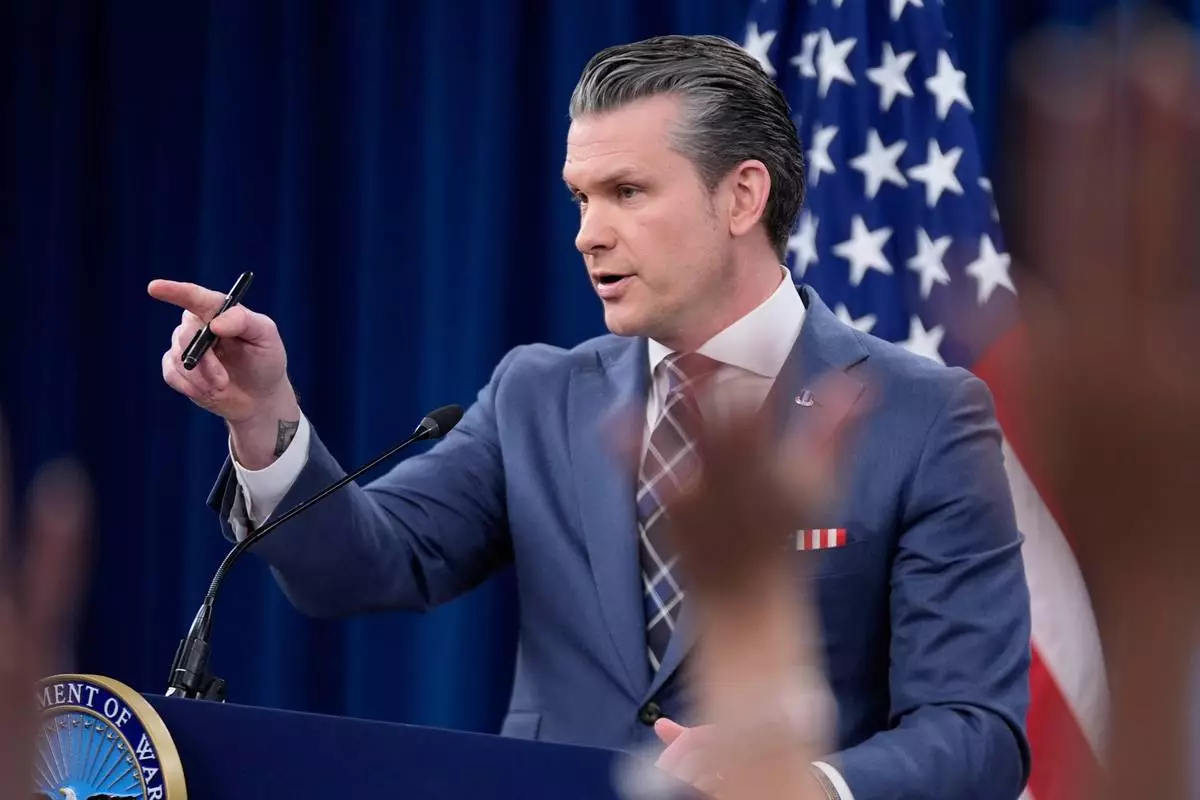 Defense Secretary Pete Hegseth speaks to members of the media during a press briefing at the Pentagon in Washington, Thursday, March 19, 2026. (AP Photo/Manuel Balce Ceneta)