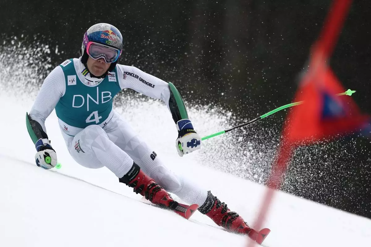 Brazil's Lucas Pinheiro Braathen competes in an alpine ski, men's giant slalom race, at the Lillehammer World Cup Finals, in Hafjell, Norway, Tuesday, March 24, 2026. (AP Photo/Gabriele Facciotti)