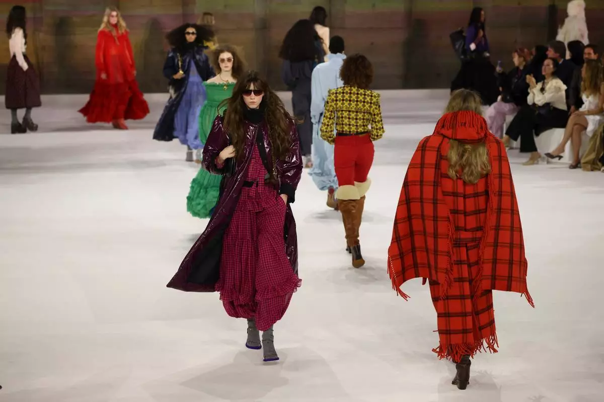Models wear creations from the Chloe Fall/Winter 2026-2027 Women's collection presented in Paris, Thursday, March 5, 2026. (AP Photo/Tom Nicholson)