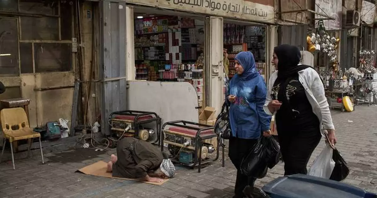Photos show daily life in Iraq's Basra near Iranian border as war slows trade