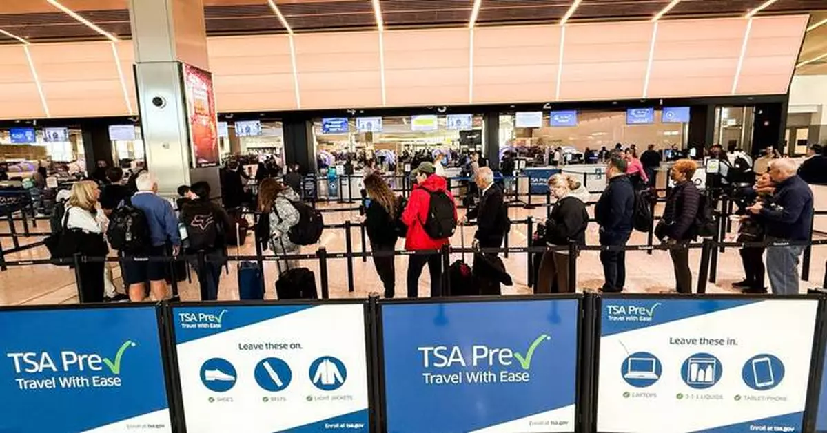 The Latest: Over 450 TSA officers have quit since the partial shutdown began
