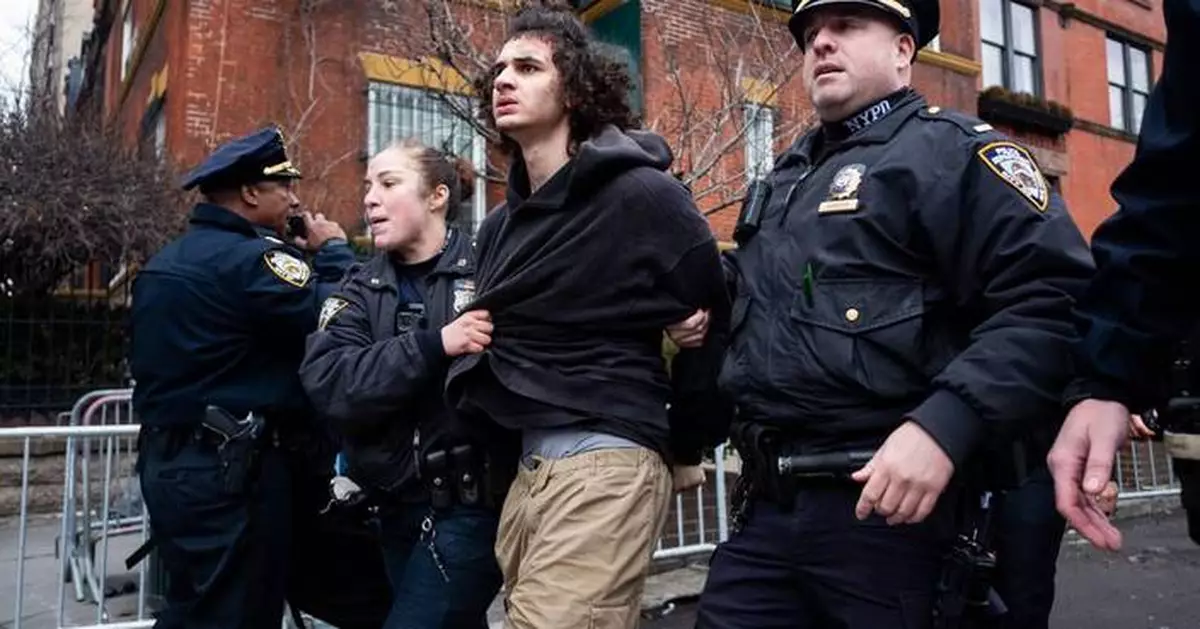 FBI hunts for clues after 2 men charged with lighting bombs at NYC protest
