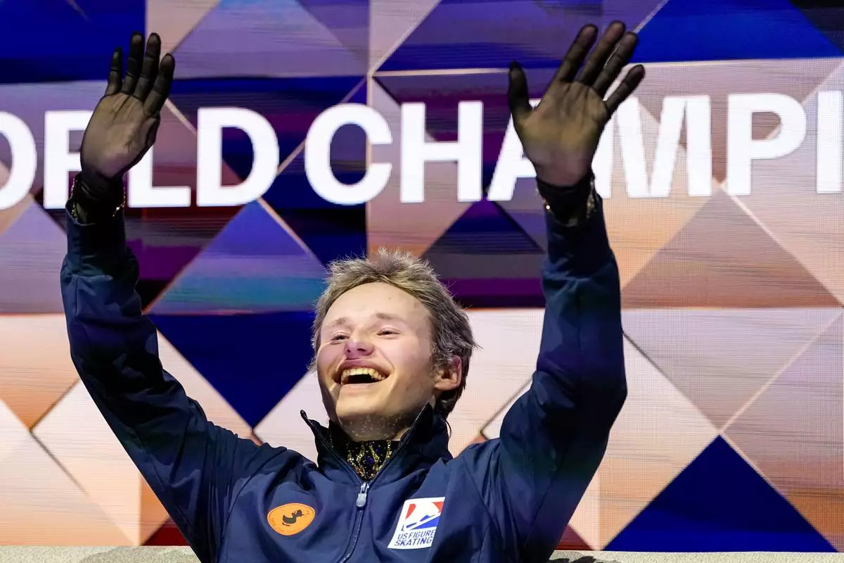 Ilia Malinin from the United States reacts while awaiting his scores during the men free skating at the Figure Skating World Championships in Prague, Czech Republic, Saturday, March 28, 2026. (AP Photo/Petr David Josek)