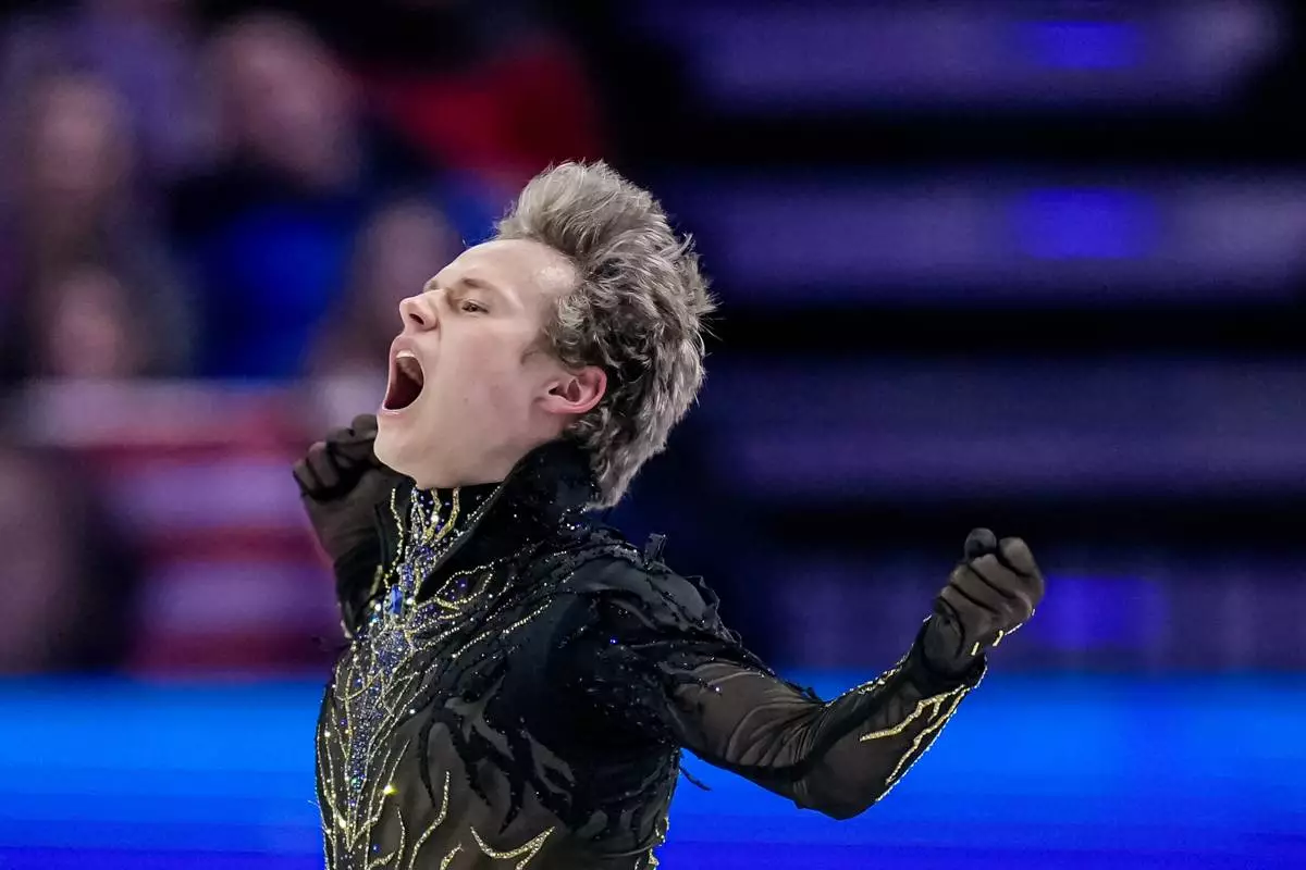 Ilia Malinin from the United States reacts at the end of his routine during the men free skating at the Figure Skating World Championships in Prague, Czech Republic, Saturday, March 28, 2026. (AP Photo/Petr David Josek)