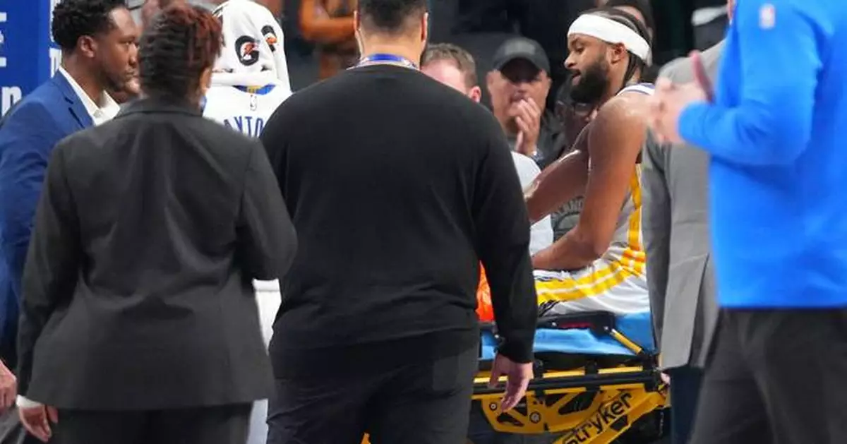 Moses Moody scores 23 before apparently serious injury late as Warriors beat Mavs 137-131 in OT