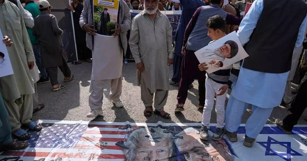Pakistani Shiites rally to denounce US-Israeli strikes on Iran as US Embassy issues a security alert