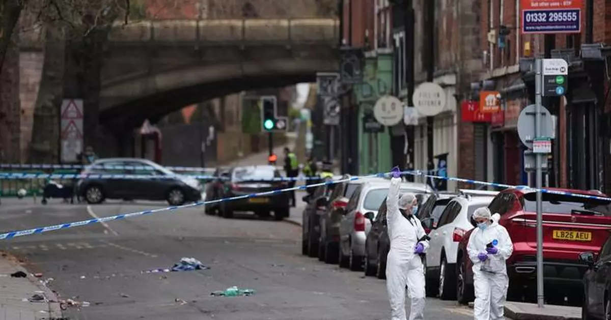 UK police arrest a man after a car hits pedestrians in the English city of Derby, injuring 7