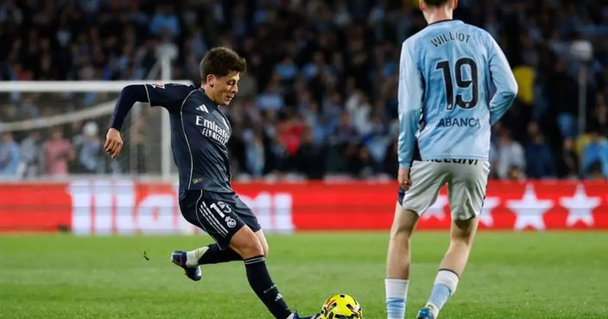 Last-gasp deflected strike by Valverde gives Real Madrid 2-1 victory at Celta Vigo