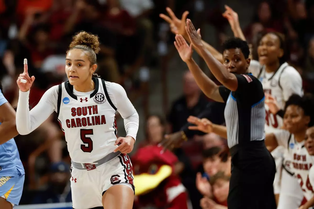 South Carolina guard Tessa Johnson (5) reacts after making a 3-pointer against Southern during the second half of the first round of the NCAA college basketball tournament, Saturday, March 21, 2026, in Columbia, S.C. (AP Photo/Nell Redmond)