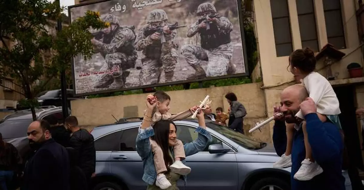 Photos show Lebanon's Catholics marking Palm Sunday as the shadow of war weighs heavily