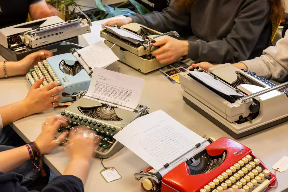 Students use typewriters to complete a writing assignment in German at Cornell University, Friday, March 20, 2026, in Ithaca, N.Y. Their professor, Grit Matthias Phelps, brings out the typewriters once each semester for students to disconnect from technology and connect with the assignment in a different way. (AP Photo/Lauren Petracca)