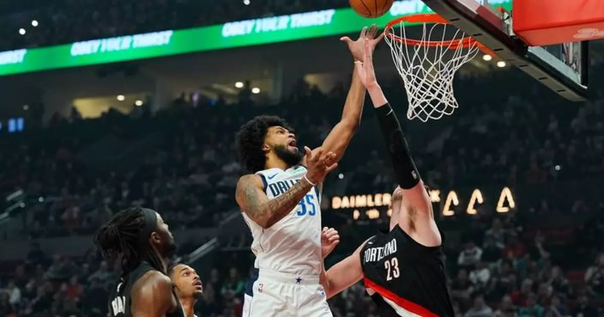 Bagley scores 26 points and Mavericks snap a 5-game skid in a 100-93 win against Trail Blazers
