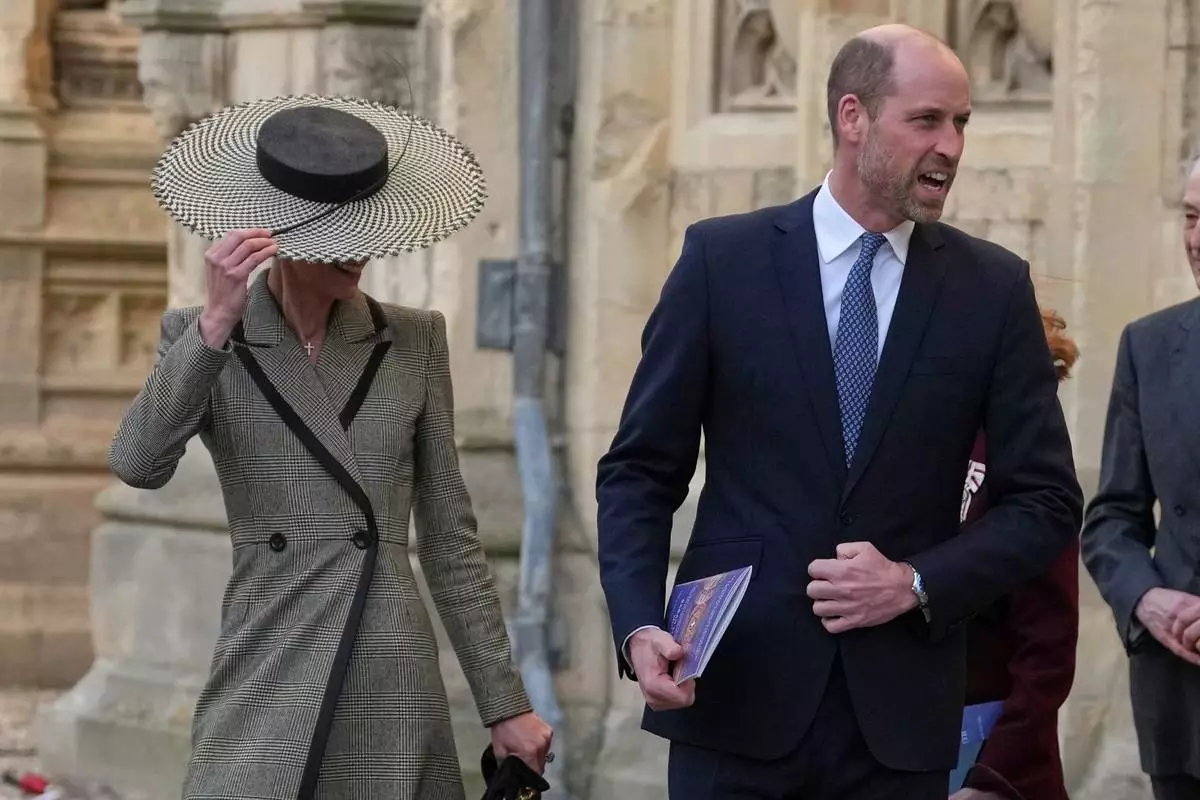 Britain's Kate, Princess of Wales, and Prince William leave after the installation of Sarah Mullally as archbishop of Canterbury in Canterbury, England, Wednesday, March 25, 2026, the first woman ever to lead the Church of England. (AP Photo/Alastair Grant)