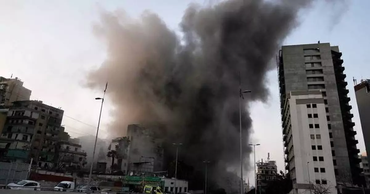 Photos of a central Beirut district struck by Israeli bombs