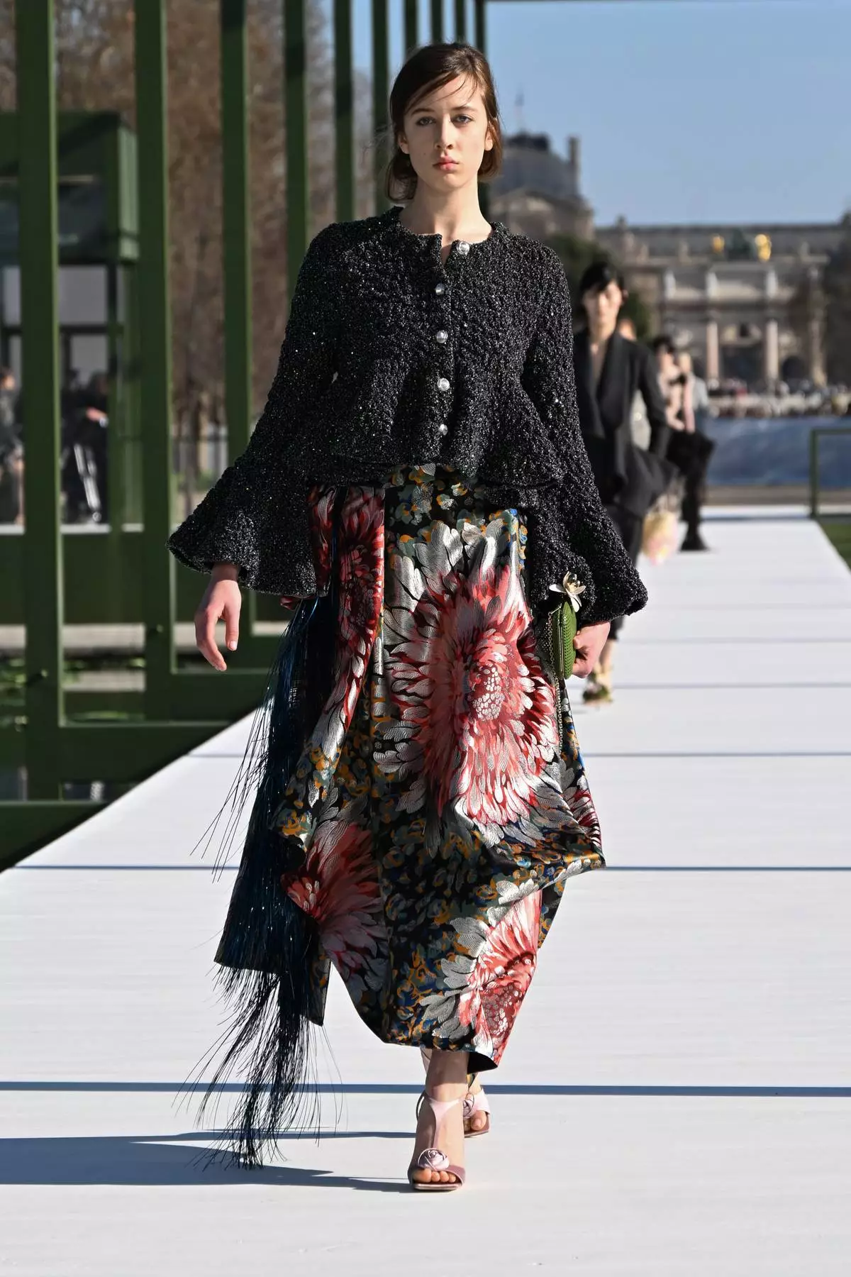 A model wears a creation from the Christian Dior Fall/Winter 2026-2027 Women's collection presented in Paris, Tuesday, March 3, 2026. (AP Photo/Emma Da Silva)