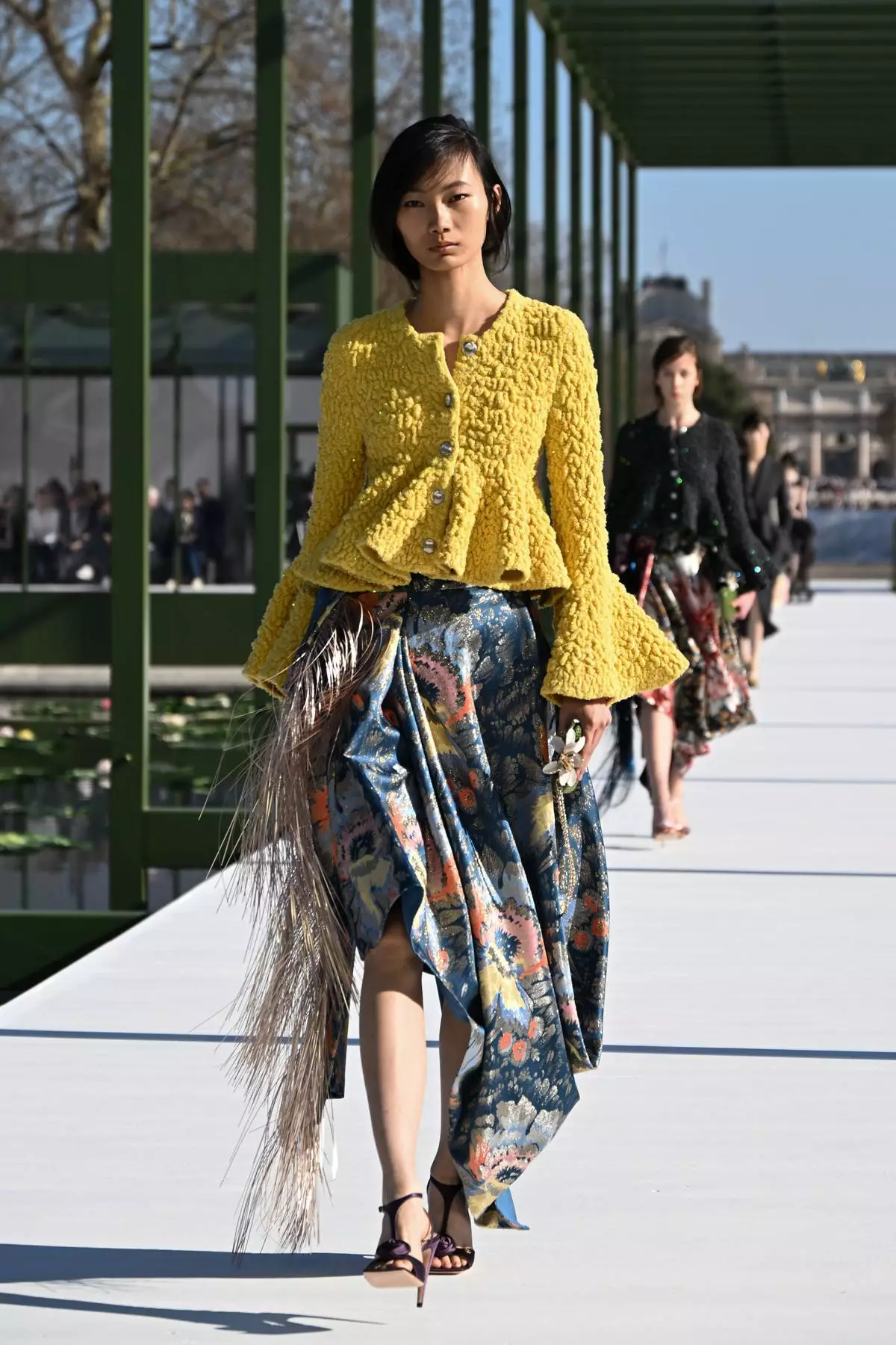 A model wears a creation from the Christian Dior Fall/Winter 2026-2027 Women's collection presented in Paris, Tuesday, March 3, 2026. (AP Photo/Emma Da Silva)