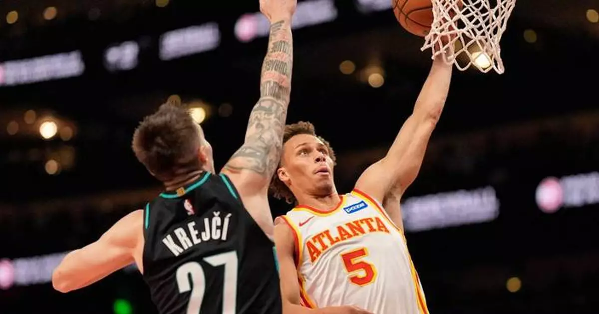 Hawks score 44 points in the 1st quarter and rout the Trail Blazers 135-101