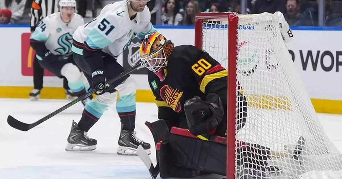 Bobby McMann has 2 goals and an assist in his visa-delayed Kraken debut against Canucks