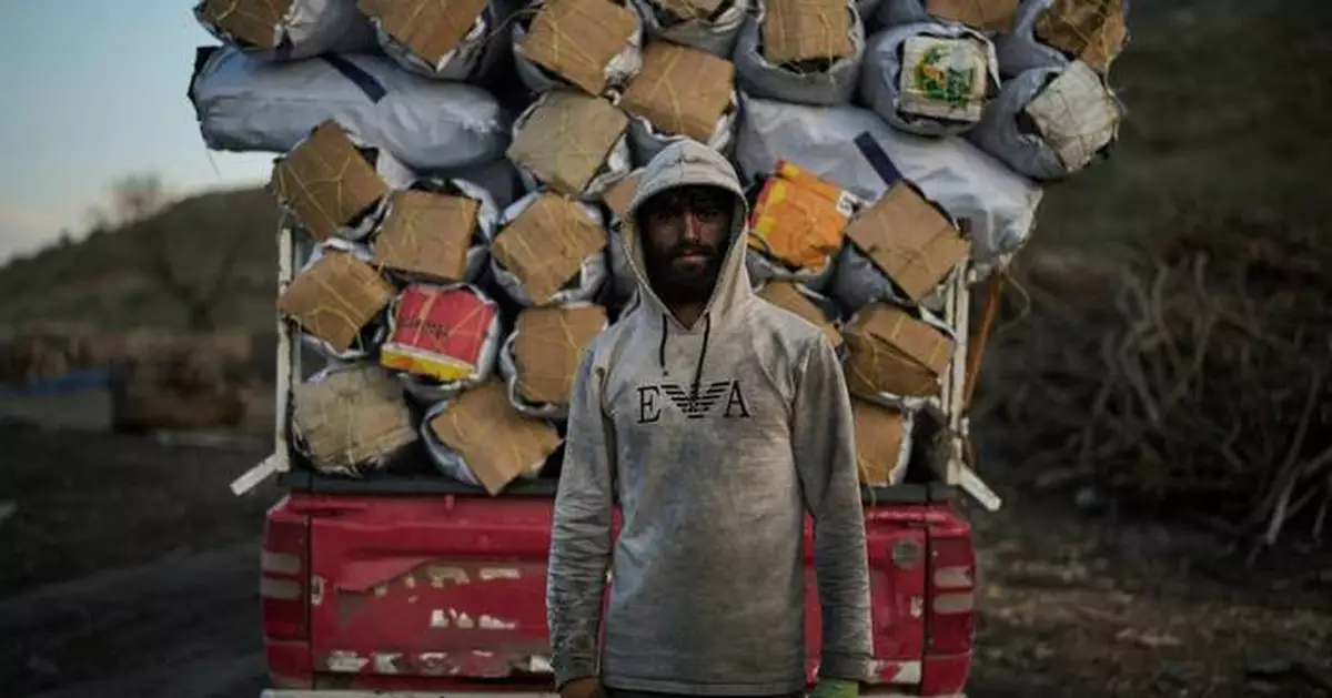 Photos: Charcoal workers in a quiet Kurdish village carry on as war unfolds