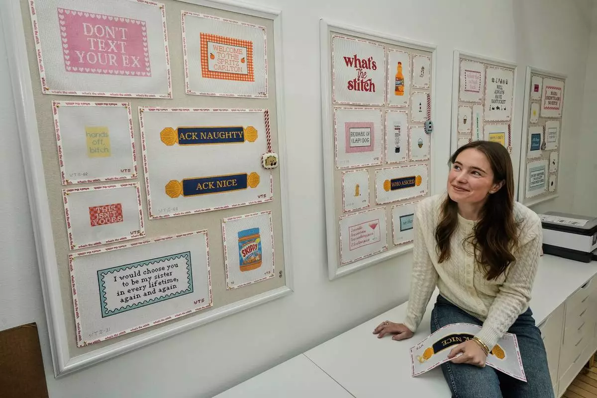 Emma MacTaggart, founder of What's the Stitch needlepoint business, is photographed in her studio, in New York, Monday, Feb. 9, 2026. (AP Photo/Richard Drew)