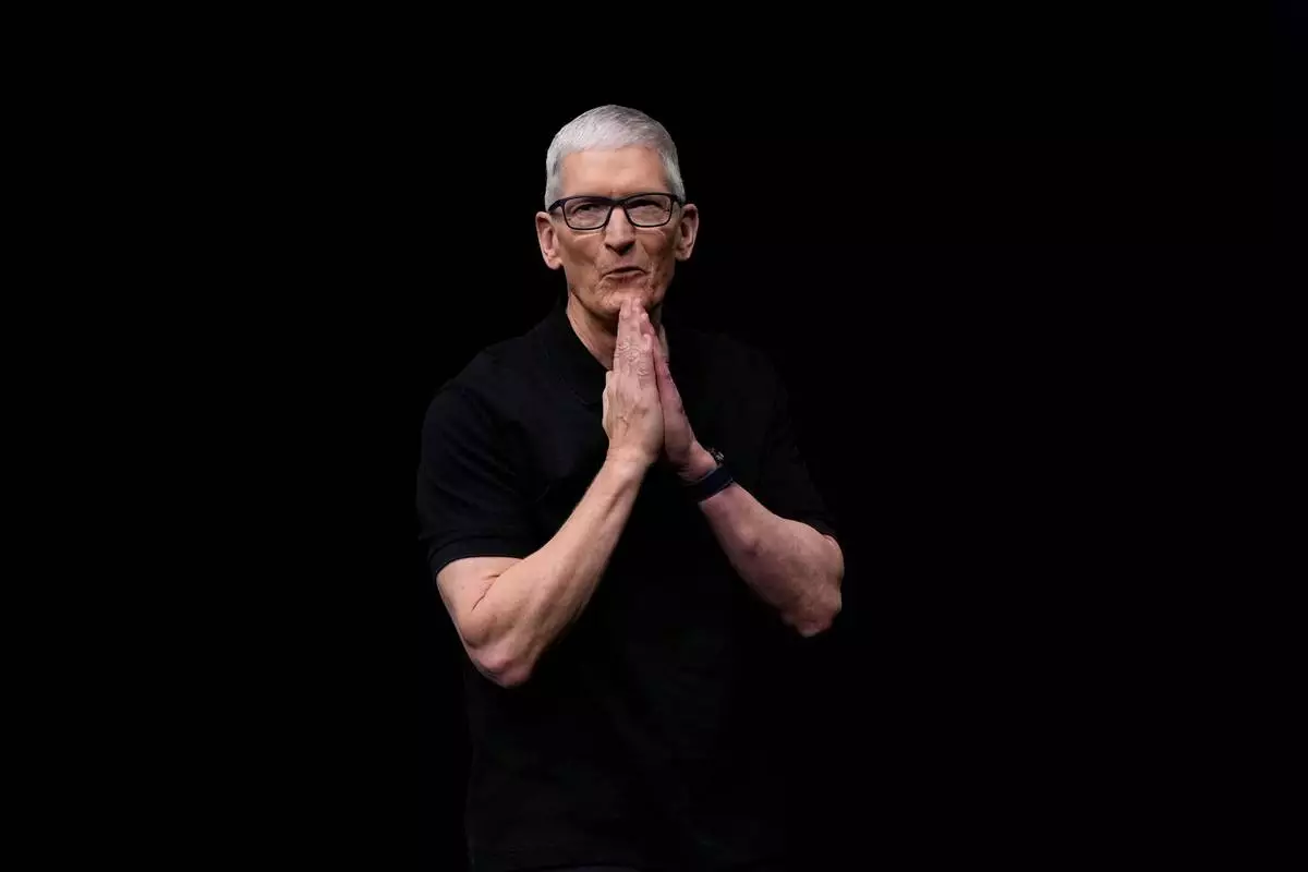 FILE - Apple CEO Tim Cook speaks on stage during an announcement of new products at Apple Park in Cupertino, Calif., Tuesday, Sept. 9, 2025. (AP Photo/Godofredo A. Vásquez, File)