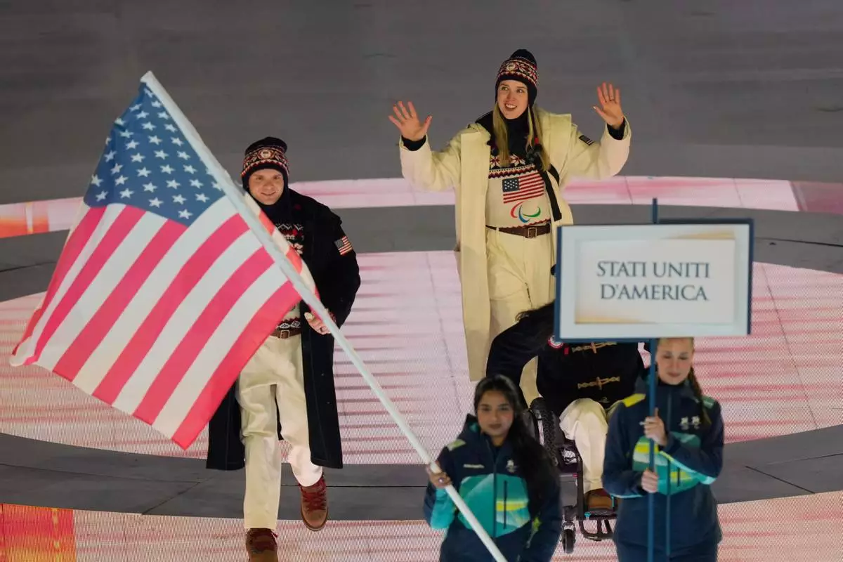 Athletes from the United States enter during the opening ceremony at the 2026 Winter Paralympics, in Verona, Italy, Friday, March 6, 2026. (AP Photo/Luca Bruno)