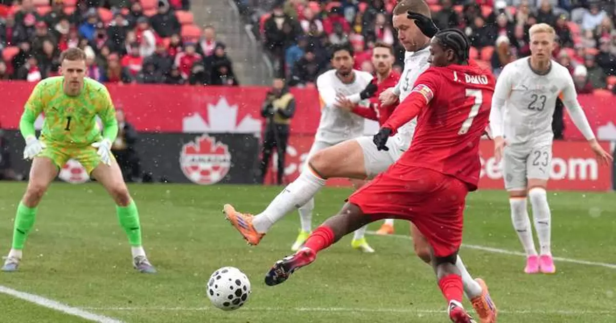 David scores twice, Buchanan shown red as Canada battles back to tie Iceland 2-2