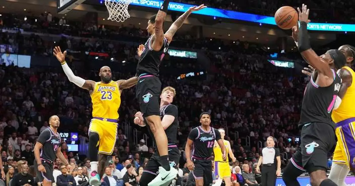 Luka Doncic scores 60, LeBron James ties games-played mark and Lakers top Heat for 8th straight win