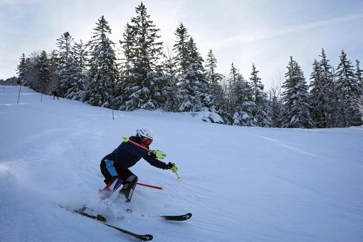 Melanie De Bona skis during training in Lans-en-Vercors, near Grenoble, France, Friday, Feb. 13, 2026. (AP Photo/Laurent Cipriani)