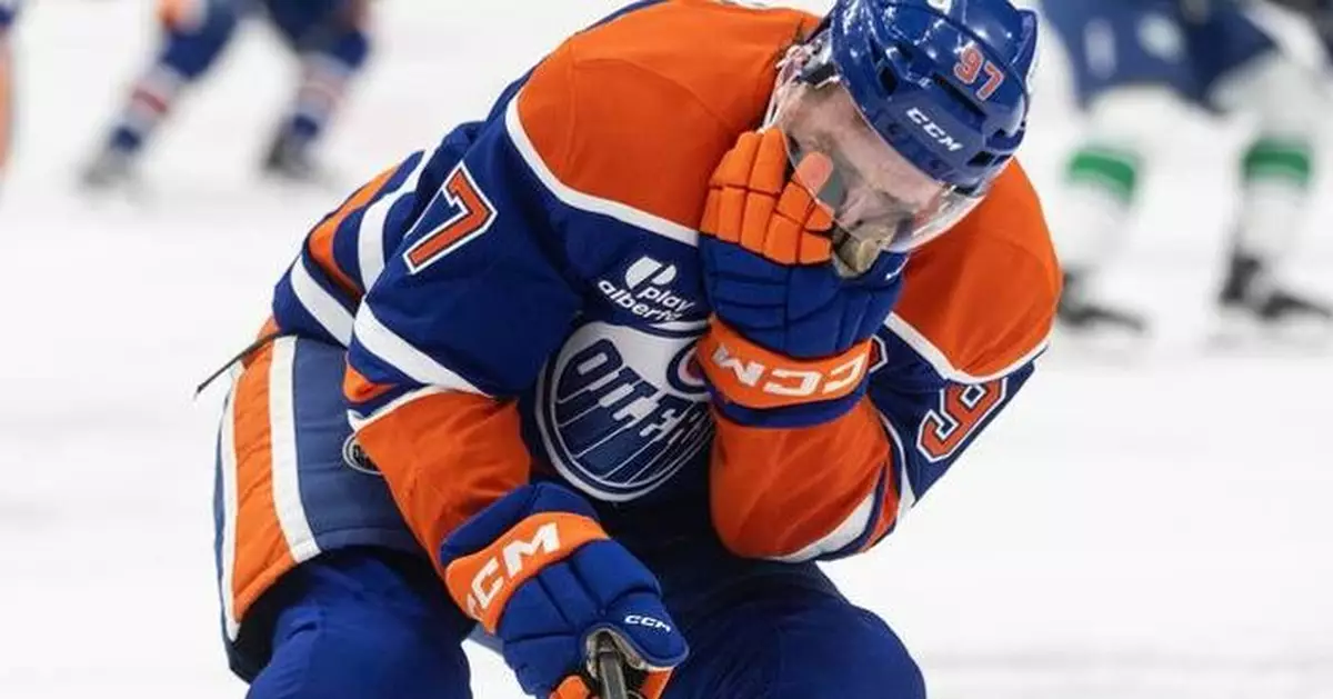 McDavid has 4 assists in Oilers' finale to take NHL scoring title with 138 points